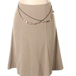 Suede like skirt with accessories. Classy and elegant. Tan.